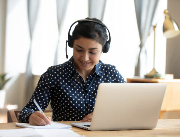 Woman working from home with headset